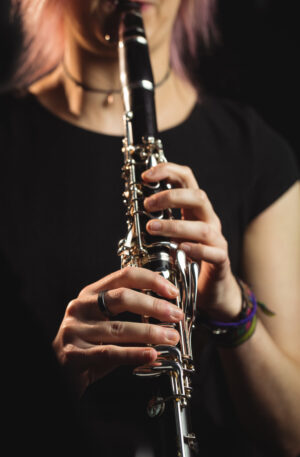 woman playing clarinet music school